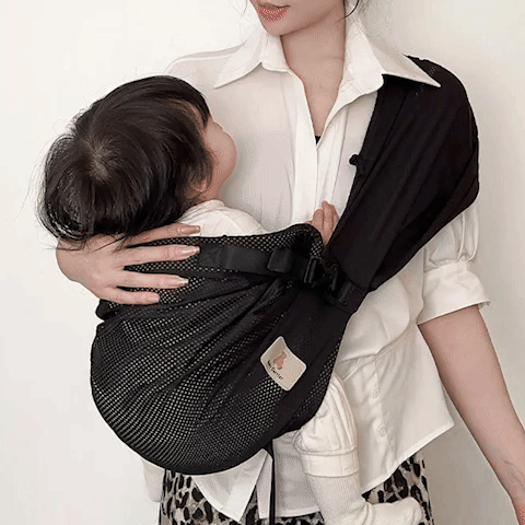 bébé porté en écharpe beige et noir images en rotations