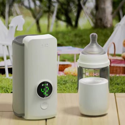 chauffe biberon nomade sur table extérieure