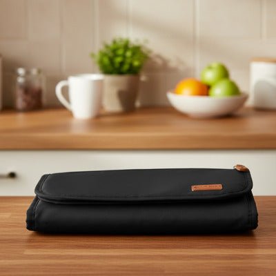 matelas à langer nomade noir table
