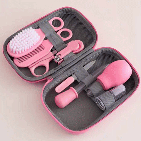 trousse de soin bebe en rotation bleu et rose