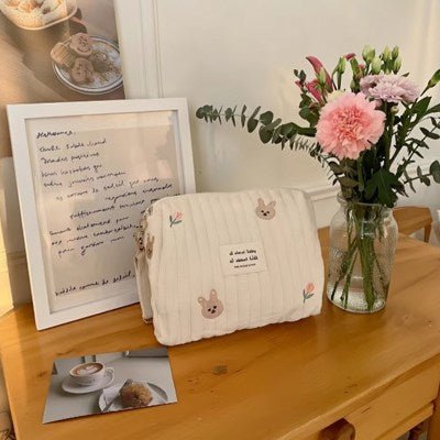 trousse toilette bébé lapin table